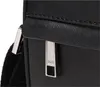 A close-up shot of a black BOSS bag, focusing on the zipper detail and strap. Anteprima dell’immagine prodotto