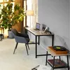 A home office setup with a desk, chair, and plant. Náhled obrázku produktu