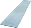 A long, narrow, light blue rug is shown from a diagonal angle against a white background.