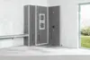 A bathroom construction scene with Wedi building boards installed in a corner, showing a niche and plumbing fixtures. Voir les images du produit