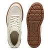 A pair of beige Puma Karmen II Idol SD shoes, one shown from the top and the other from the sole. Produktbild-Vorschau