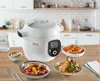 A kitchen counter with a Tefal Cook4me+ smart multi-function pot and several bowls of food. Podgląd zdjęcia produktu