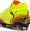 Close-up view of the heel and side of a neon yellow soccer cleat. Produktbild-Vorschau