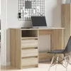A desk with a laptop and a chair in a room. Anteprima dell’immagine prodotto