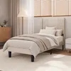 A bedroom scene with a bed, nightstand, and dresser. Podgląd zdjęcia produktu