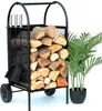 A black metal firewood rack filled with logs, with a potted plant to the right. Podgląd zdjęcia produktu
