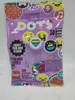 A purple packaging bag for LEGO DOTs Extra Dots - Series 1. Produktbild-Vorschau