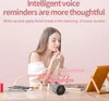 A woman applying lipstick while a timer is on the table. Podgląd zdjęcia produktu