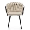 A single, upholstered armchair with a distinctive braided backrest. Náhled obrázku produktu