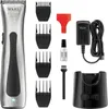 A collection of hair trimming accessories and a charger. Produktbild-Vorschau