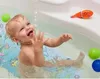 A baby is taking a bath and playing with toys. Produktbild-Vorschau