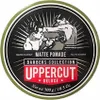A circular tin of Uppercut Deluxe Matte Pomade with a boxing-themed illustration on the lid. Podgląd zdjęcia produktu