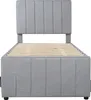 A grey upholstered bed frame with a slatted wooden base, shown from the front. Produktbild-Vorschau