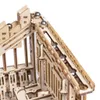 A close-up view of a wooden marble run construction kit with several silver marbles on a track. Podgląd zdjęcia produktu