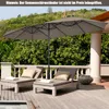 A double patio umbrella shades two lounge chairs on a wooden deck. Náhled obrázku produktu