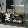 A rustic-style entryway bench with shelves, featuring a hanging organizer and a scarf draped over it. The background is a textured gray wall. Anteprima dell’immagine prodotto