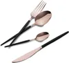 A set of cutlery with rose gold heads and black handles, arranged diagonally on a white background. Náhľad obrázku produktu