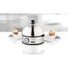 A stainless steel egg cooker is shown on a white surface, with two eggs in holders placed on either side. Produktbild-Vorschau