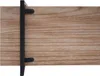 A close-up view of a wooden shelf with black metal brackets. Náhľad obrázku produktu