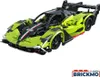 A lime green and black toy sportscar on a white background. Produktbild-Vorschau