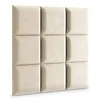 A grid of cream-colored, square upholstered wall panels. Anteprima dell’immagine prodotto
