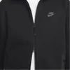 A close-up of a black Nike Tech Fleece hoodie. Náhled obrázku produktu