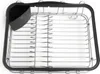 A top-down view of a metal dish rack with a black plastic compartment attached. Produktbild-Vorschau