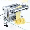 A pasta machine is shown making fresh pasta. Podgląd zdjęcia produktu