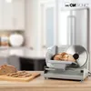A slicer with bread on a cutting board in a kitchen setting. Podgląd zdjęcia produktu