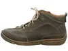 A side view of a green leather boot. Voir les images du produit