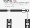 A close-up of a metal curtain rod with a distance ring and mounting brackets. Anteprima dell’immagine prodotto