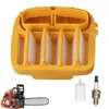 A chainsaw service kit with a yellow air filter housing, a small white fuel filter, and a spark plug, along with a portion of a chainsaw. Produktbild-Vorschau