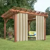 An outdoor pergola with beige curtains and outdoor furniture. Náhled obrázku produktu