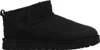 A black Ugg boot is shown from the side against a white background. Voir les images du produit