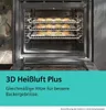An open oven with racks of cookies baking inside, with marketing text below. Produktbild-Vorschau