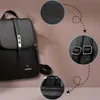 A black leather backpack with close-up details of its texture, buckles, and stitching, presented against a light brown and white background. Voir les images du produit