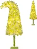 Two artificial Christmas trees are shown against a white background. The larger tree on the left is bent at the top and illuminated with warm white lights. A smaller, upright tree is visible on the right. Podgląd zdjęcia produktu