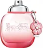 A perfume bottle with a flower charm. Podgląd zdjęcia produktu
