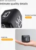 A collage of images showing a black digital timer cube from different angles and in use. Produktbild-Vorschau