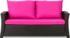 A brown rattan sofa with bright pink cushions.