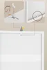 Diagrams illustrating how to attach a shelf or furniture piece to a wall using brackets. Produktbild-Vorschau