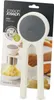 The product is shown in its retail packaging, with a background that includes images of vegetables like carrots and potatoes. Anteprima dell’immagine prodotto