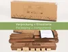 A cardboard box with product information and an illustration of the assembled product, along with disassembled wooden components of a raised garden bed. Produktbild-Vorschau