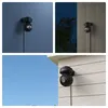 Collage of a black Reolink E1 Outdoor Pro security camera mounted on different exterior surfaces and in different lighting conditions. Produktbild-Vorschau