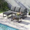 An outdoor furniture set with a sofa, ottoman, and coffee table is placed on a patio next to a swimming pool. Voir les images du produit