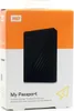 The image shows the retail packaging of a Western Digital My Passport portable hard drive. Voir les images du produit