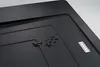 A close-up shot of a black granite sink with water droplets on its surface. The Franke logo is visible on the right side of the sink. Produktbild-Vorschau