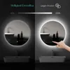 A split image showing a round LED bathroom mirror with its light on. The left side shows the mirror in a darker setting with 10% brightness indicated. The right side shows a hand touching the mirror's switch to adjust the brightness to 100%. Voir les images du produit