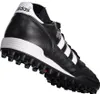 A black Adidas Mundial Team soccer shoe with white stripes and accents, shown from a low angle. Podgląd zdjęcia produktu