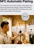A man is using a smartphone to control a light panel in a studio setting. Produktbild-Vorschau